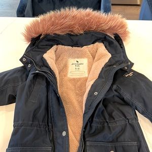 ABERCROMBIE Warm Parka. Great condition, navy blue with pink fur. Size 11/12.